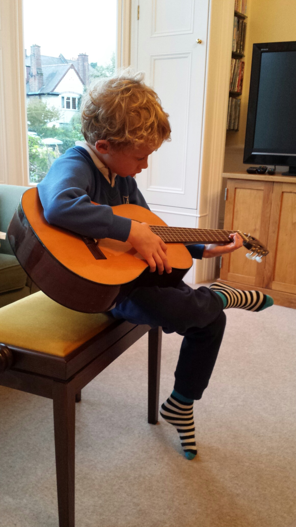 Freddie playing guitar